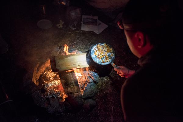Adios participant Doug Hwang cooks up some Chanterelle mushrooms.