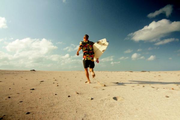 Cole daddy heads to the surf. Film still: Brandon Kuzma