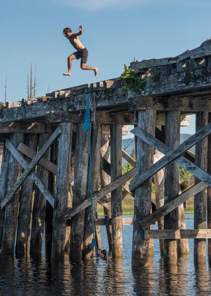Bridge jumping at Kennedy Lake.